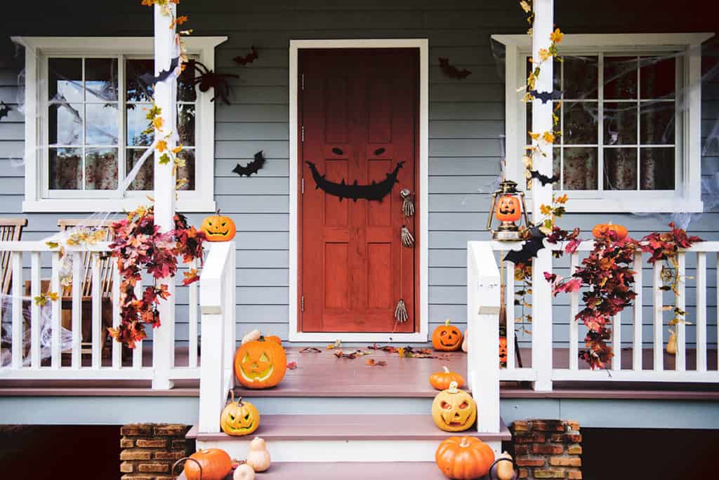 Halloween pumpkins and decorations outside a Portland house